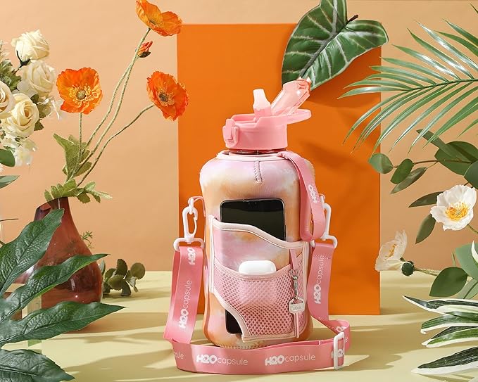 H2O Capsule 2.2L Half Gallon Water Bottle with Storage Sleeve and Removable Straw – BPA Free Large Reusable Drink Container with Handle - Big Sports Jug, 2.2 Liter (74 Ounce), Warm TieDye