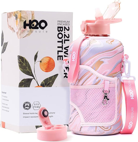 H2O Capsule 2.2L Half Gallon Water Bottle with Storage Sleeve and Removable Straw – BPA Free Large Reusable Drink Container with Handle - Big Sports Jug, 2.2 Liter (74 Ounce), Pink Marble